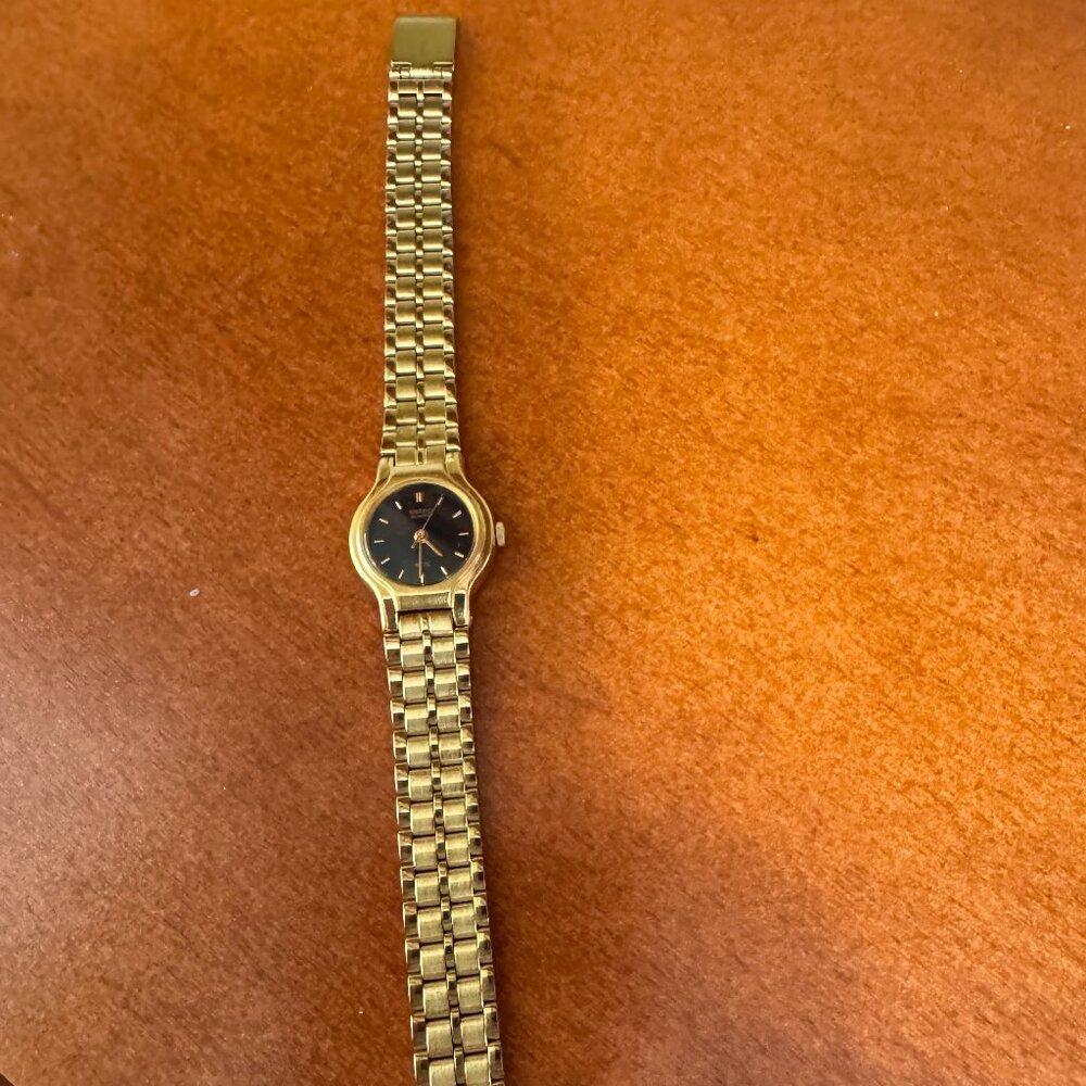 Seiko Vintage SX V401-0091 gold tone womens watch